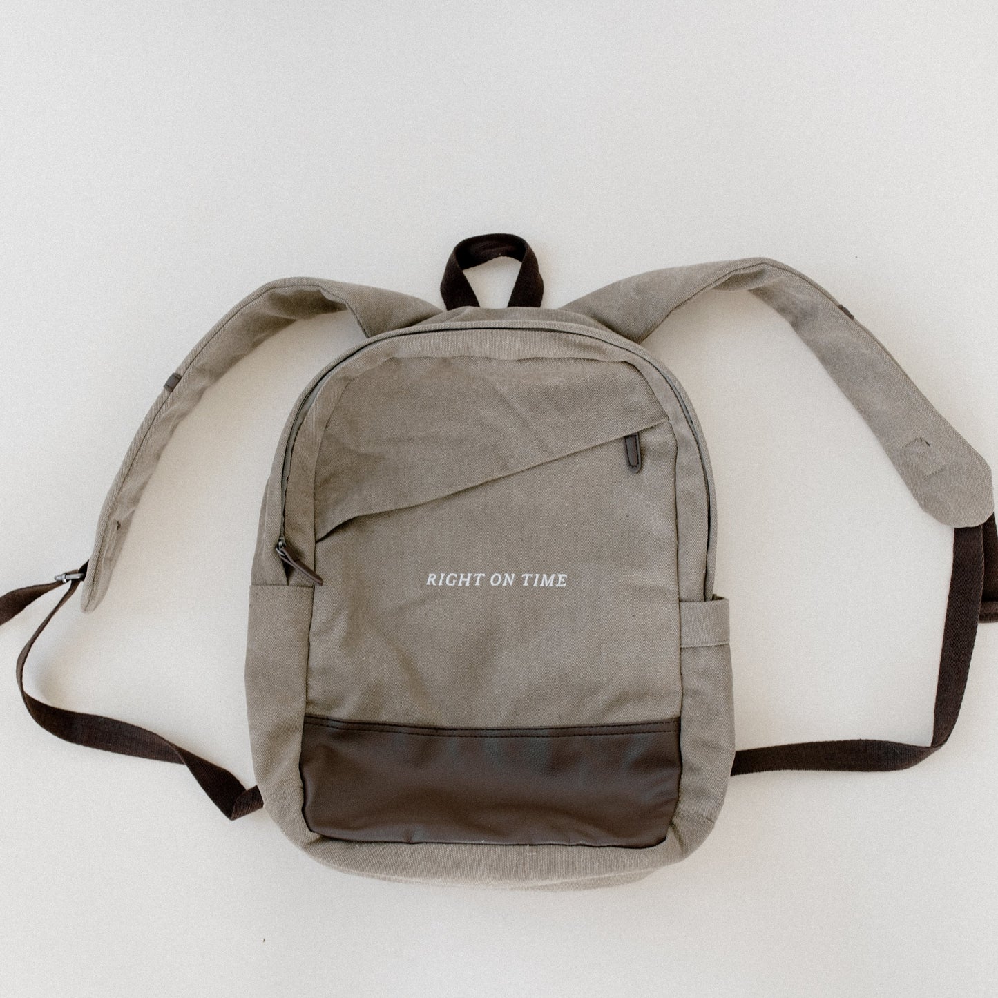 "Right On Time" Canvas Backpack