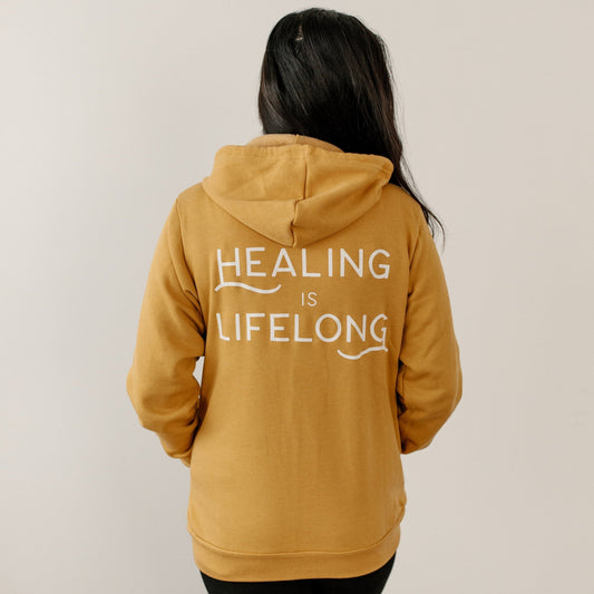 Mustard "Healing is Lifelong" Zip-Up Sweatshirt