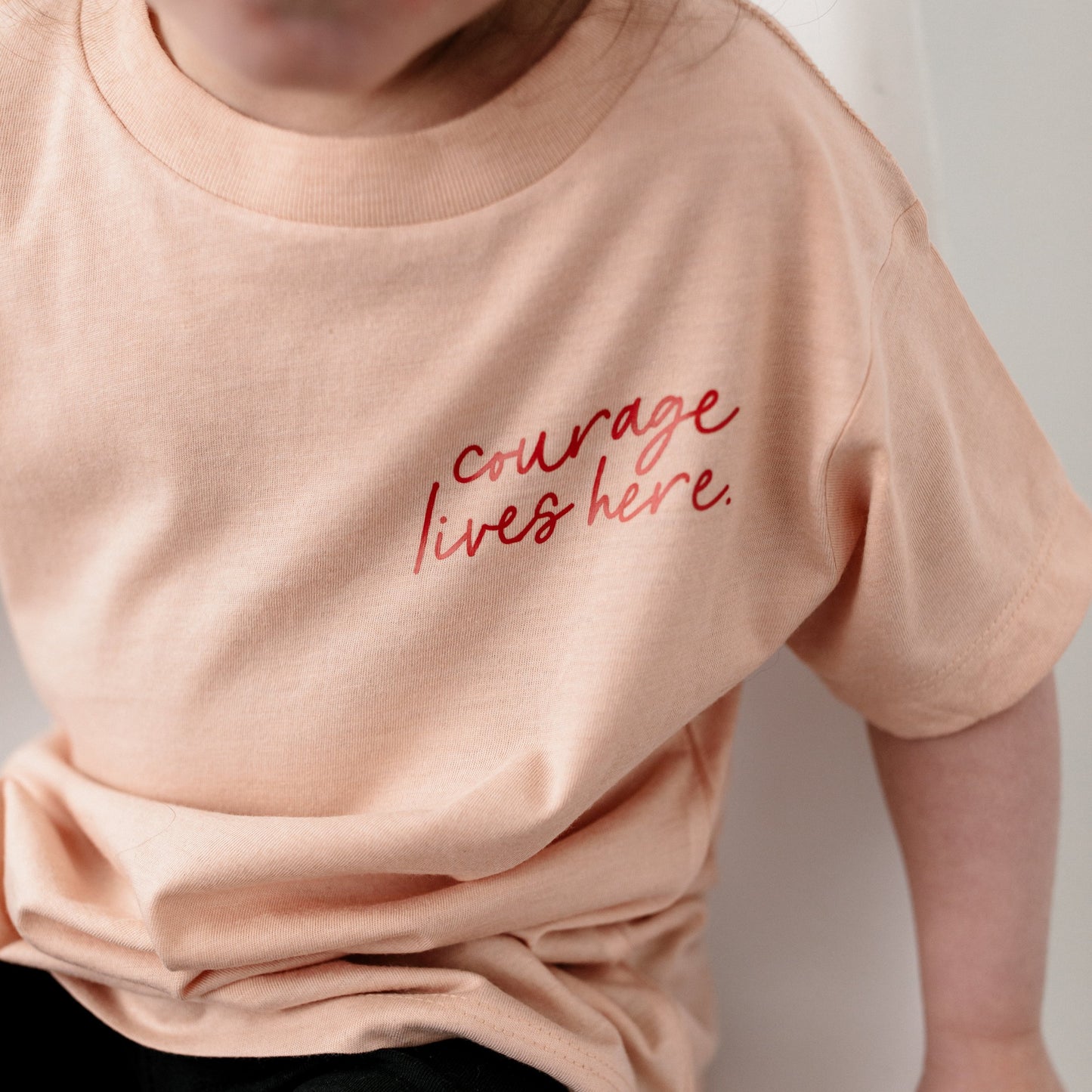"Courage Lives Here" Youth Short Sleeve Tee
